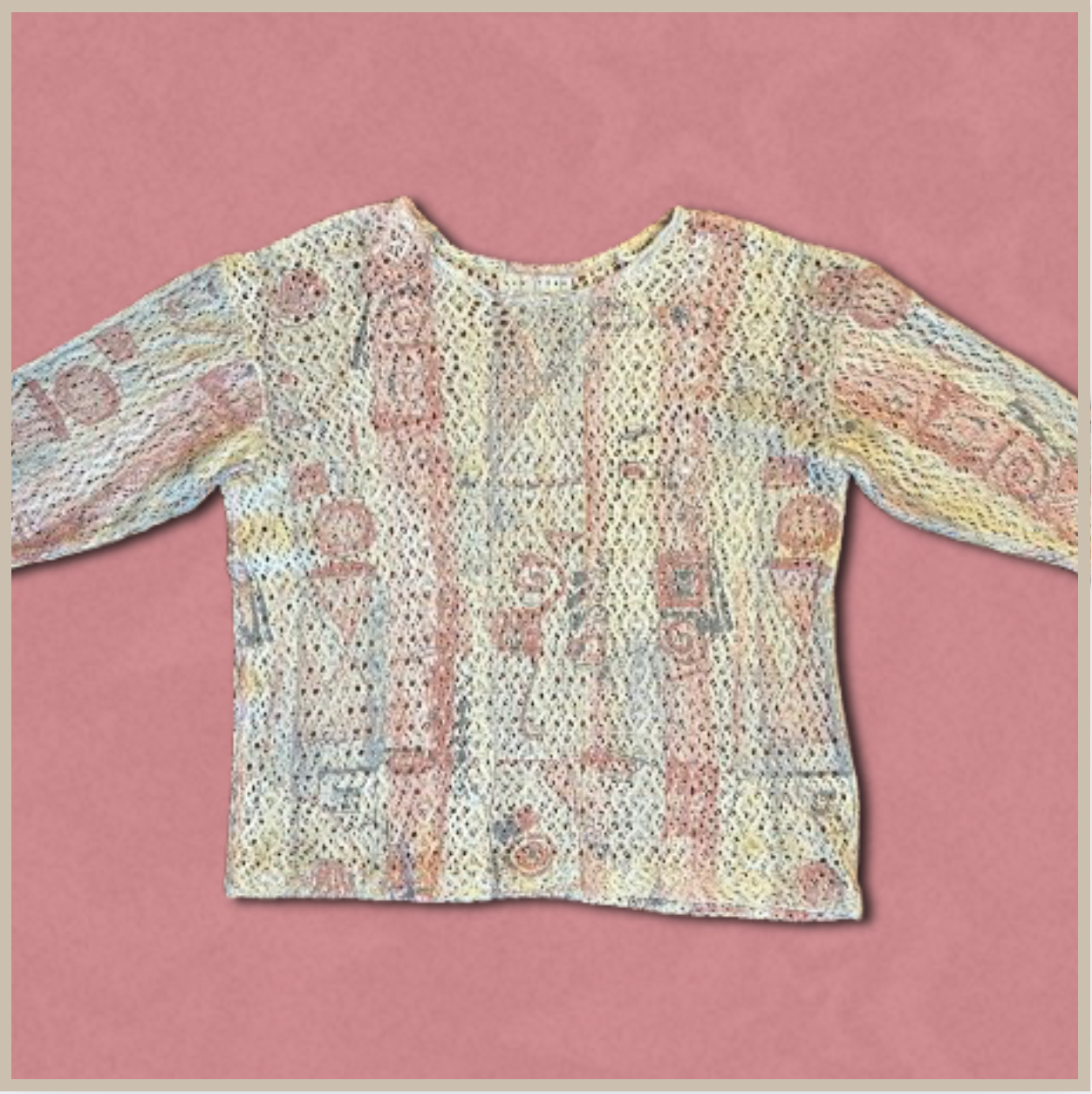 knitted cream + red/blue top with patterned design
