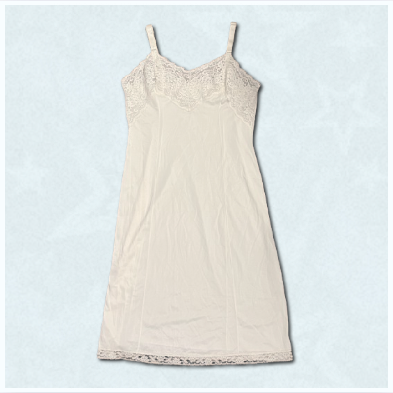 white slip dress with larger lace trim