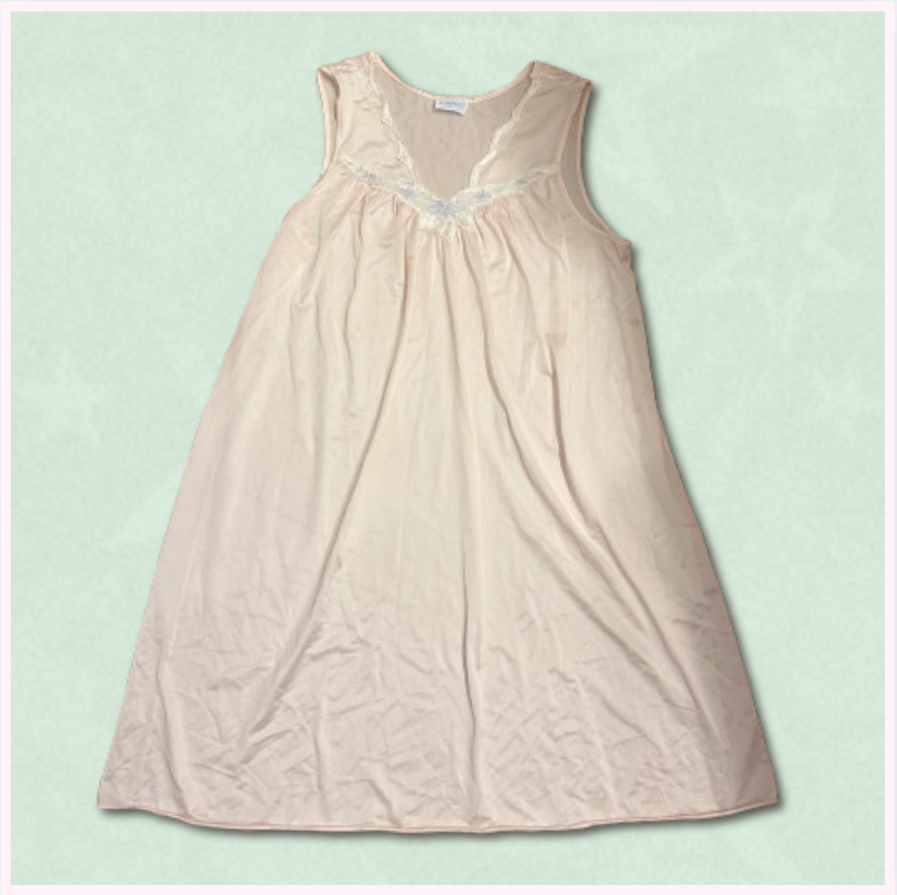 pale pink slip dress with white/blue/green trim design