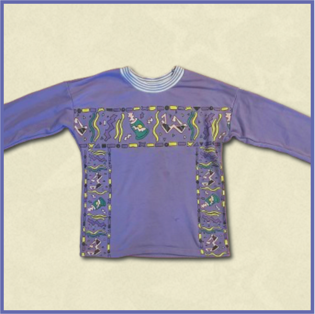 purple sweater with multicolored design