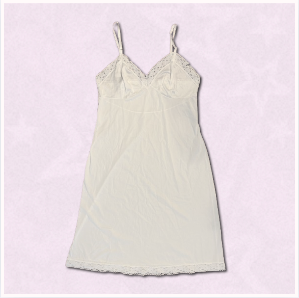 white slip dress with lace design
