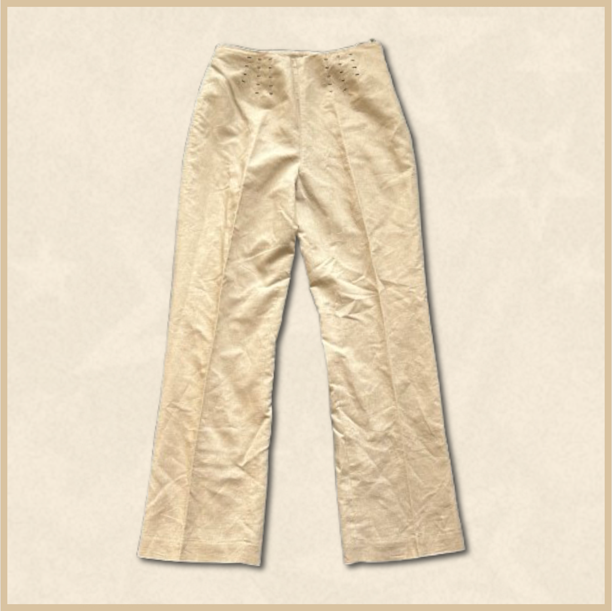 beige business pants with black sewn design