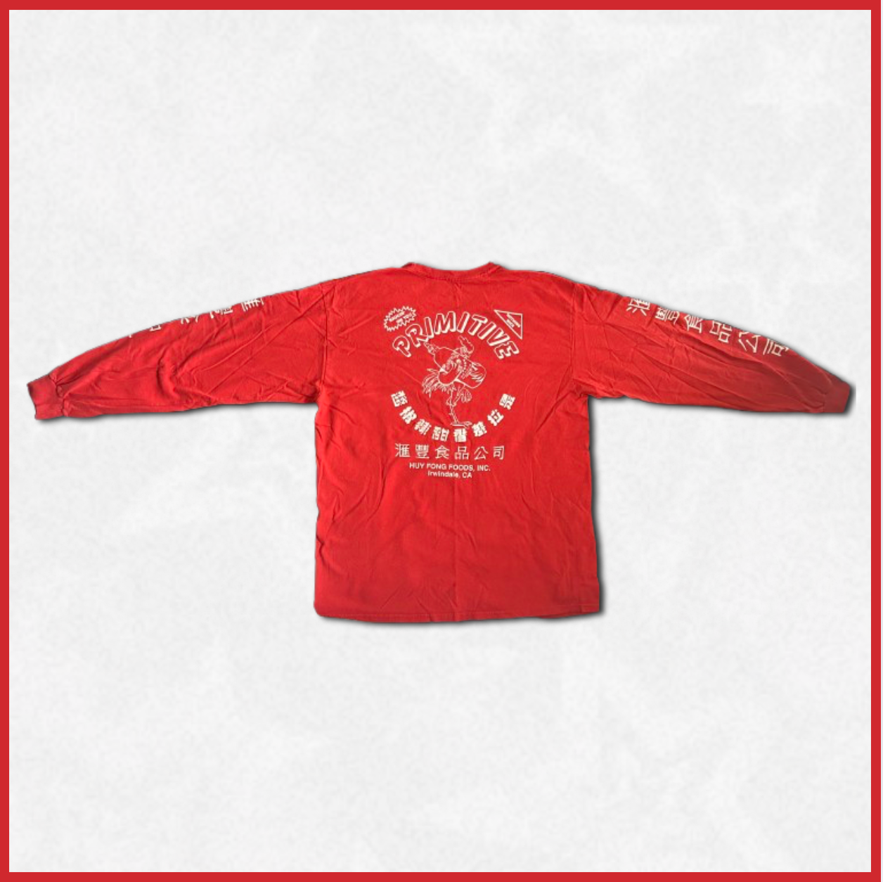 red long-sleeve "primitive" shirt with back design