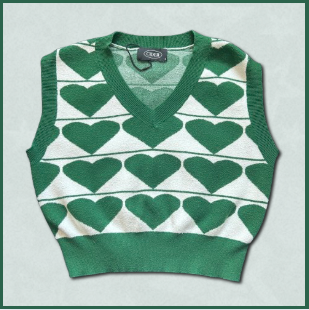 green + white cropped sweater vest with heart design