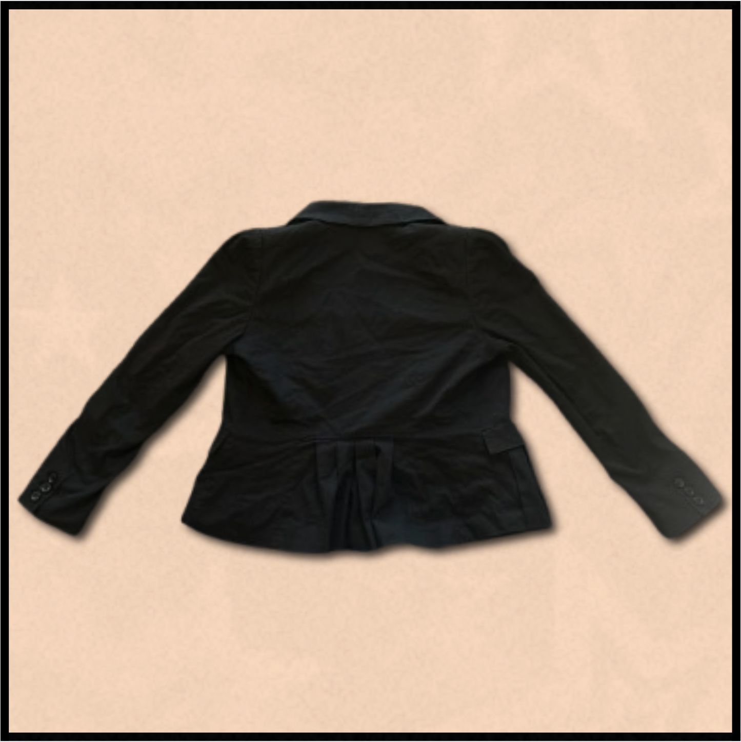 black blazer with beige/black internal design