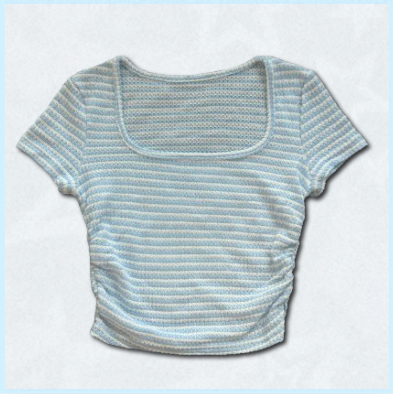 blue + white striped knitted top with scrunched side design