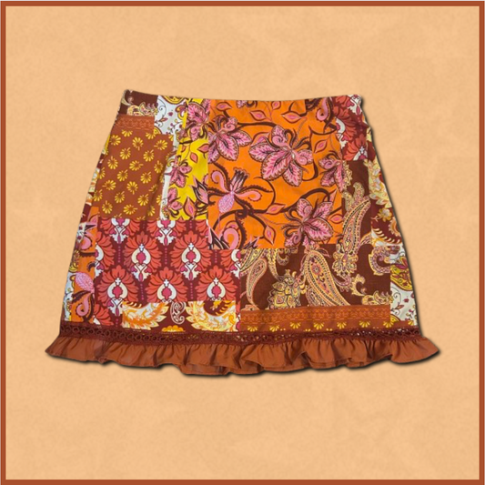 orange + red/yellow patterned skirt
