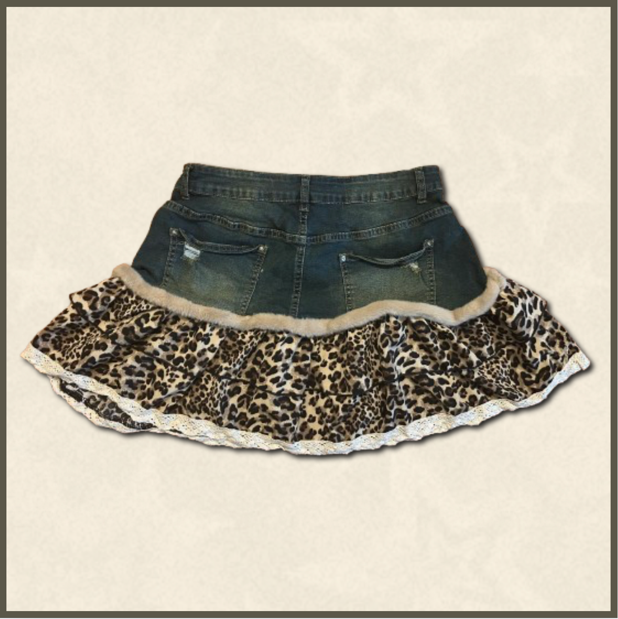 dark wash jean skirt with leopard print bottom