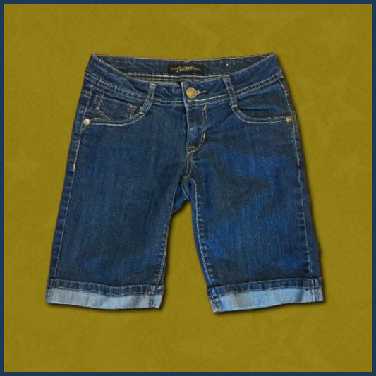 dark wash jean shorts with gold zipper design