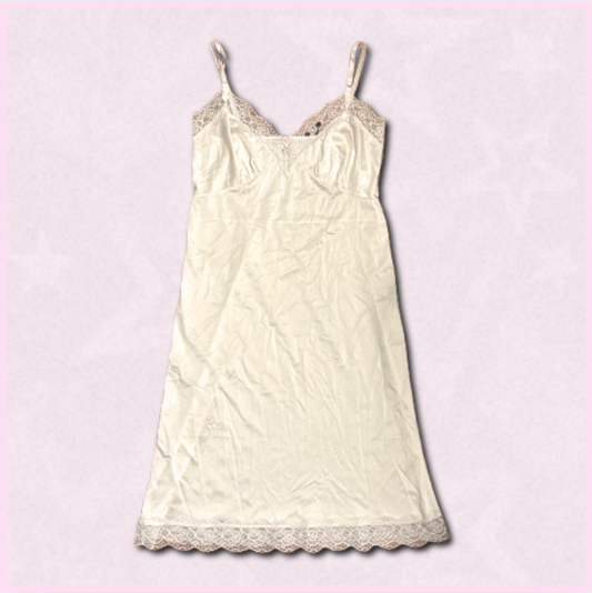 white slip dress with lace trim + flower design