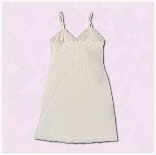 white slip dress with lace design