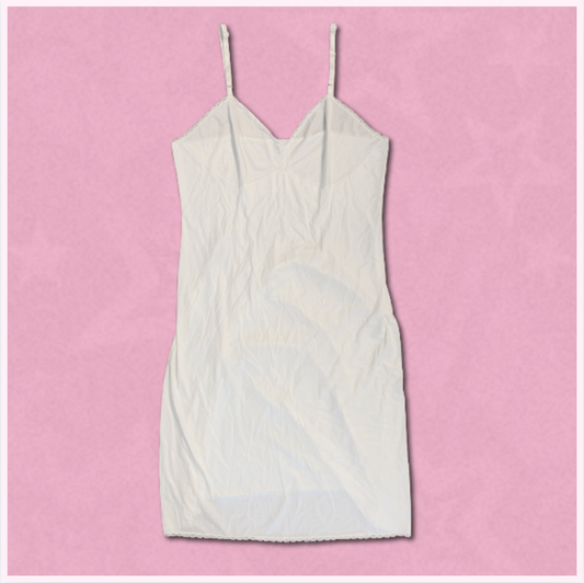 white slip dress with slight lace trim