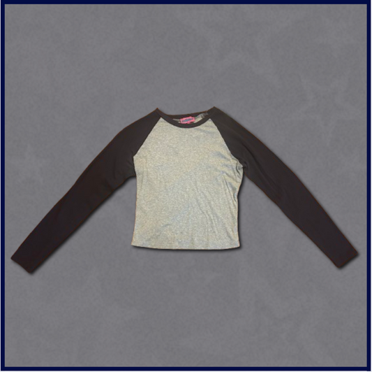 gray slim-fitting top with dark navy sleeves