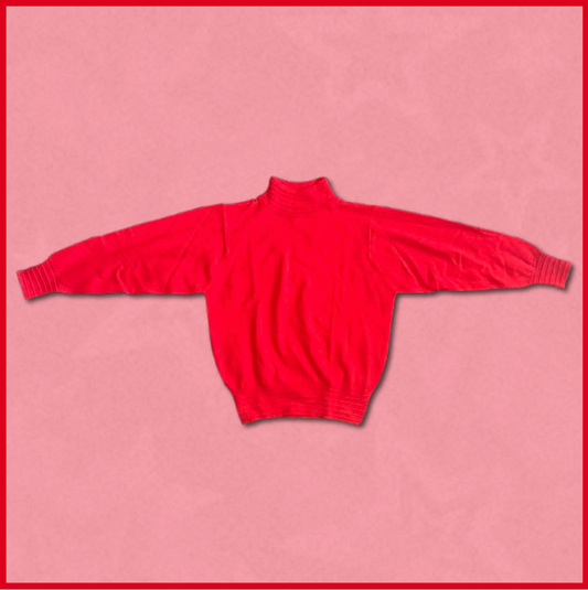 deep red turtle-neck sweater
