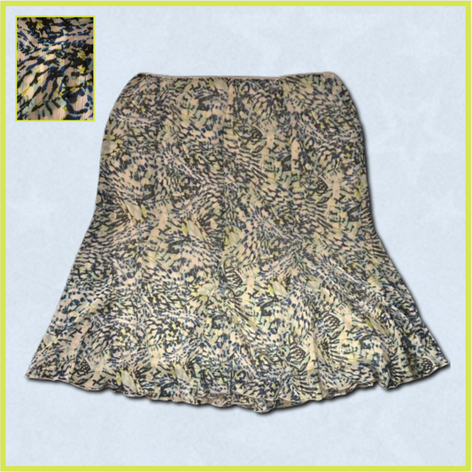 white + blue/black/green skirt with patterned design