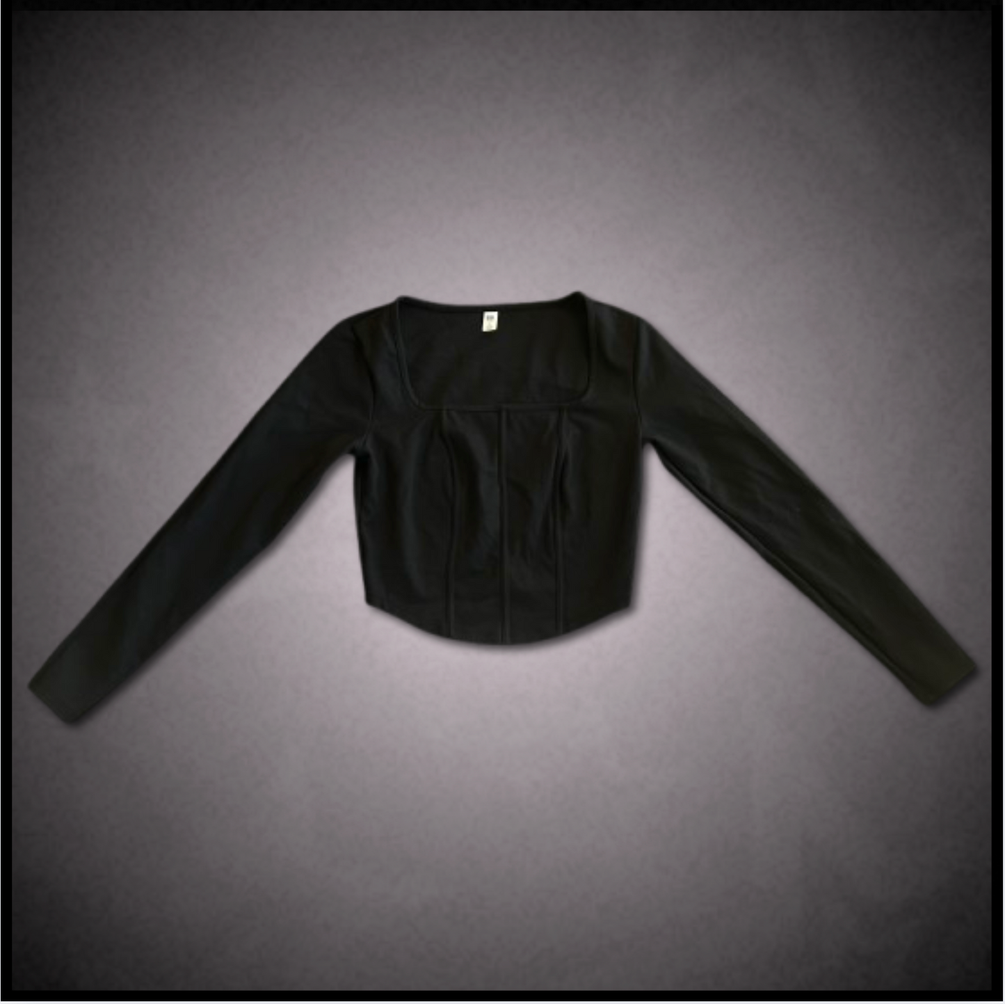 black lower-cut cropped top with corset-ridge design