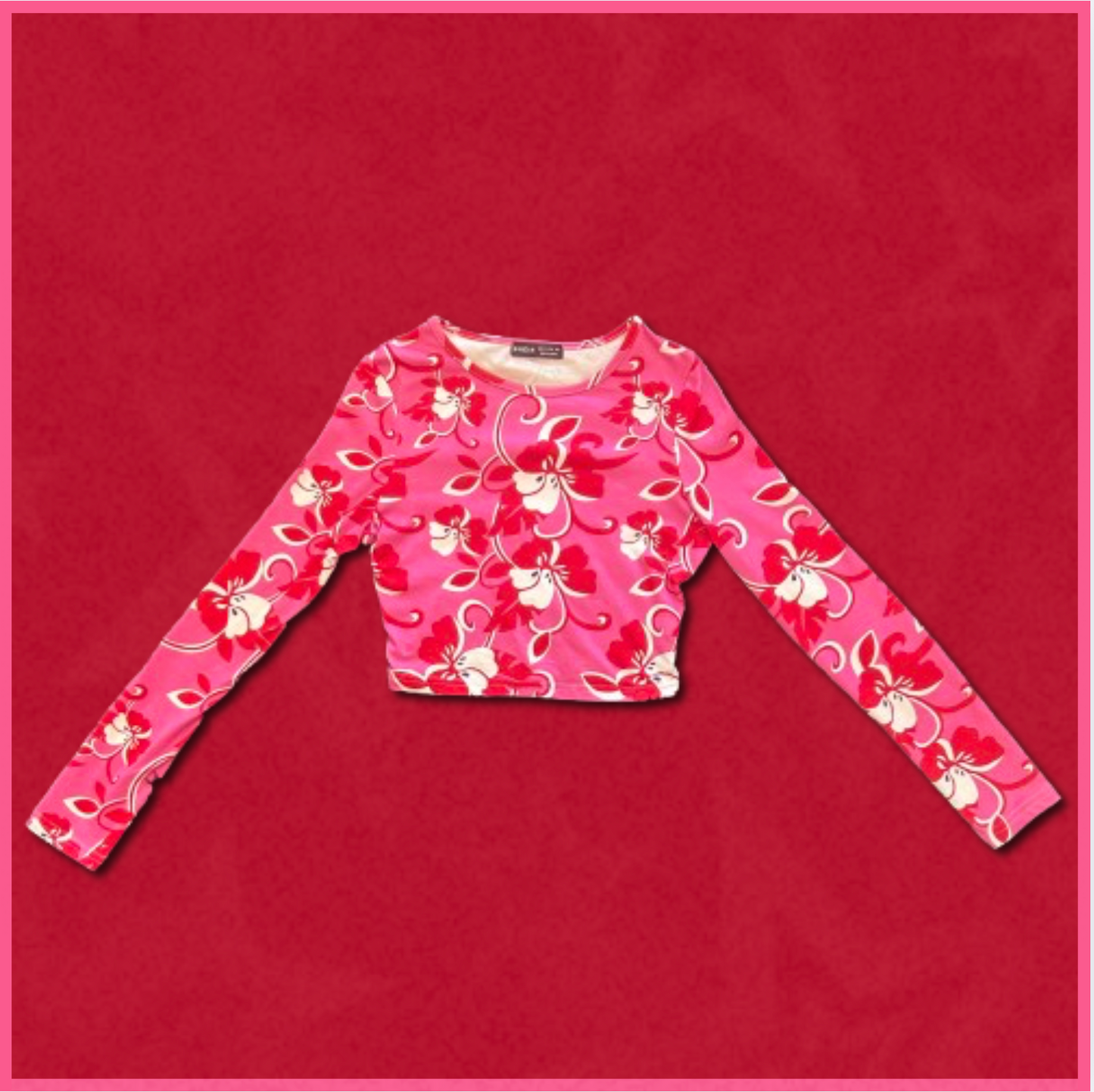 pink + red/white long-sleeve top with floral design