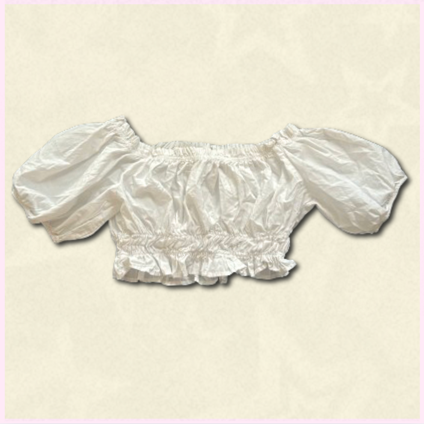 white scrunched off-shoulder cropped top