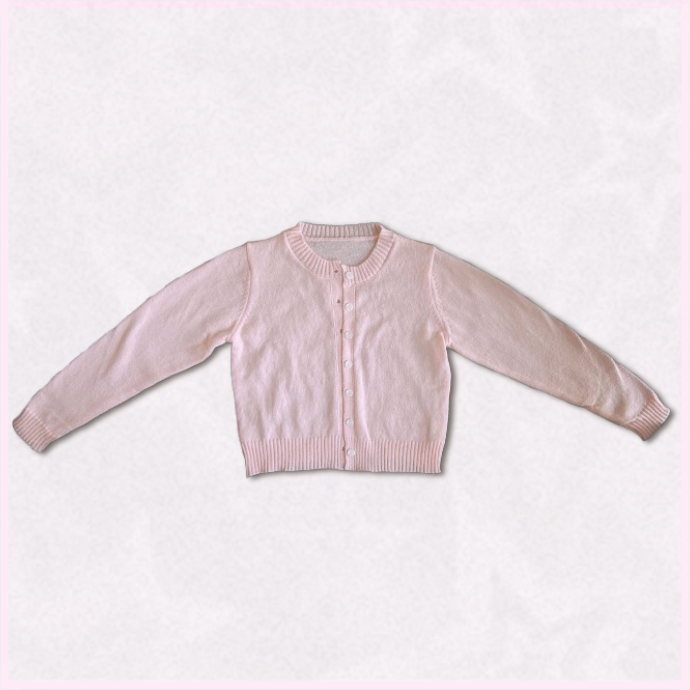 soft pink cardigan