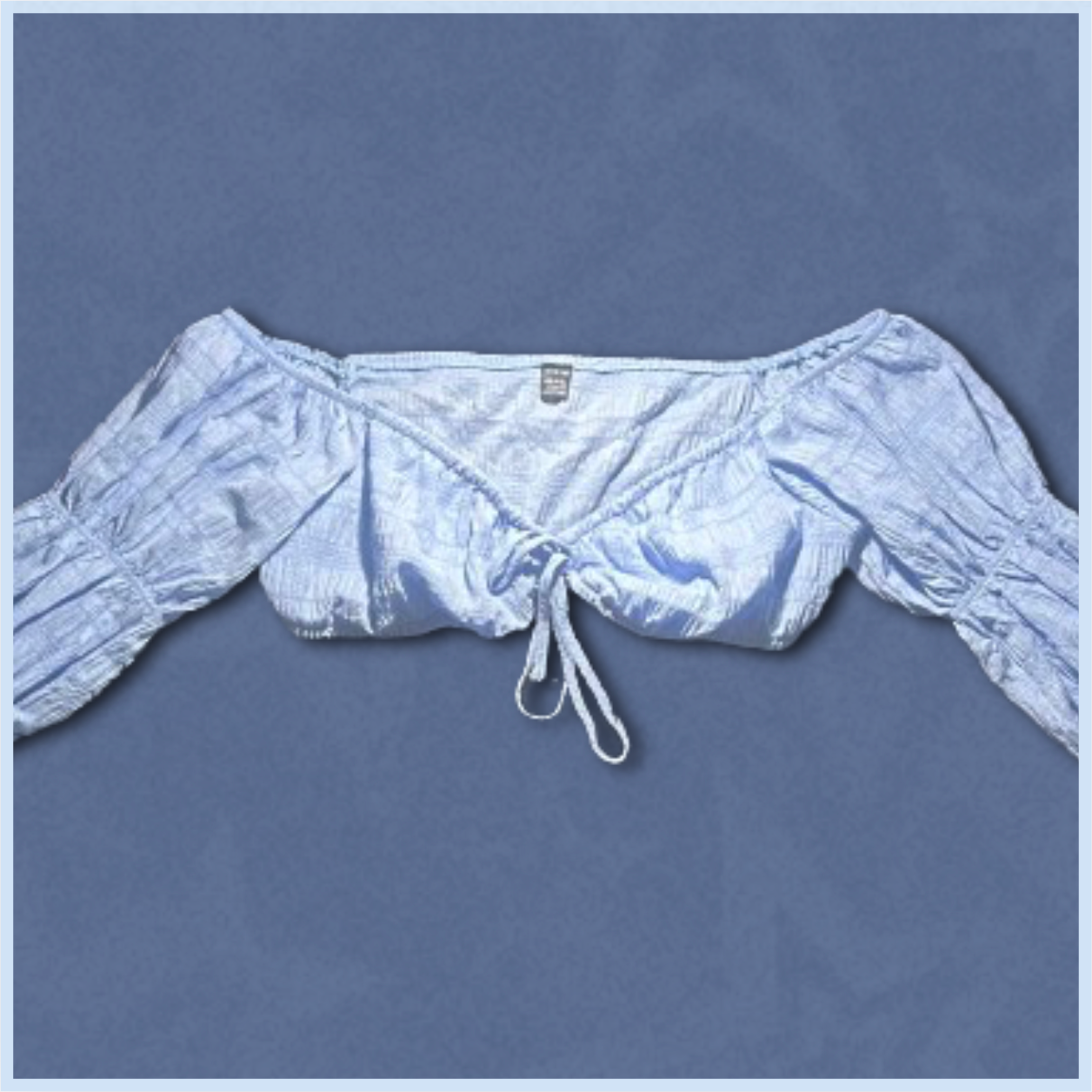 light blue off-shoulder long-sleeve top