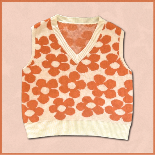 orange + off-white floral sweater vest