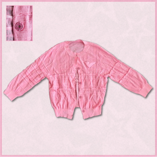 bright pink cardigan