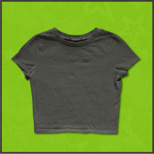 dark gray "I DON'T CARE" cropped top