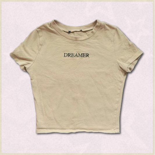 beige "DREAMER" cropped top