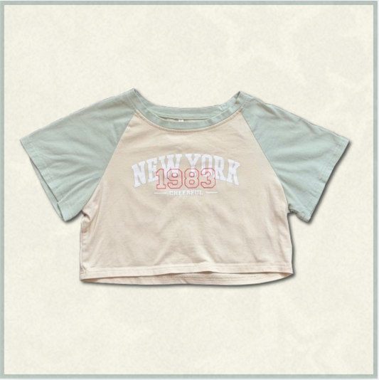 pale yellow + green "new york 1983" top